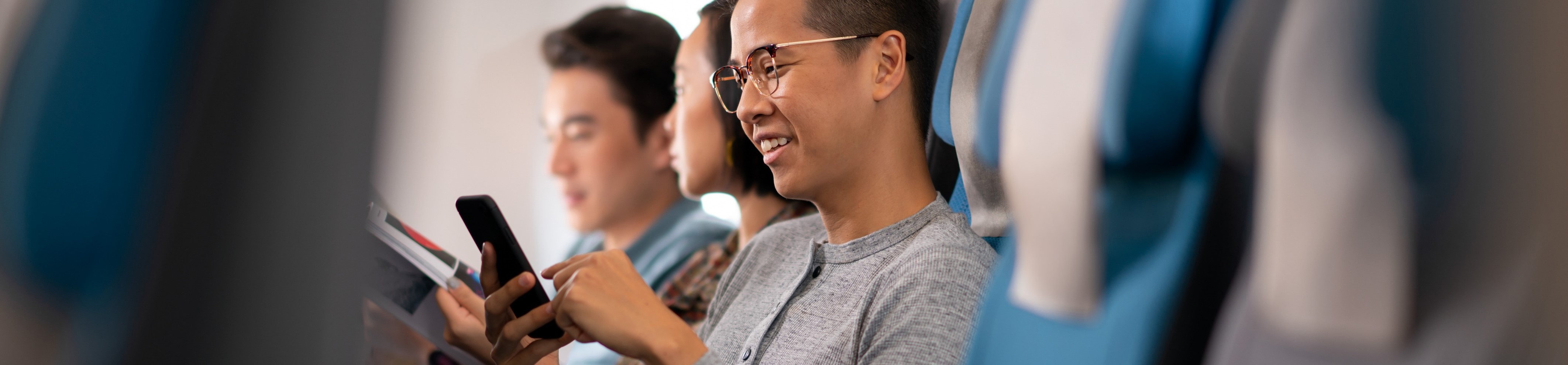 Passengers Enjoying Singapore Airlines Digital Products & Services